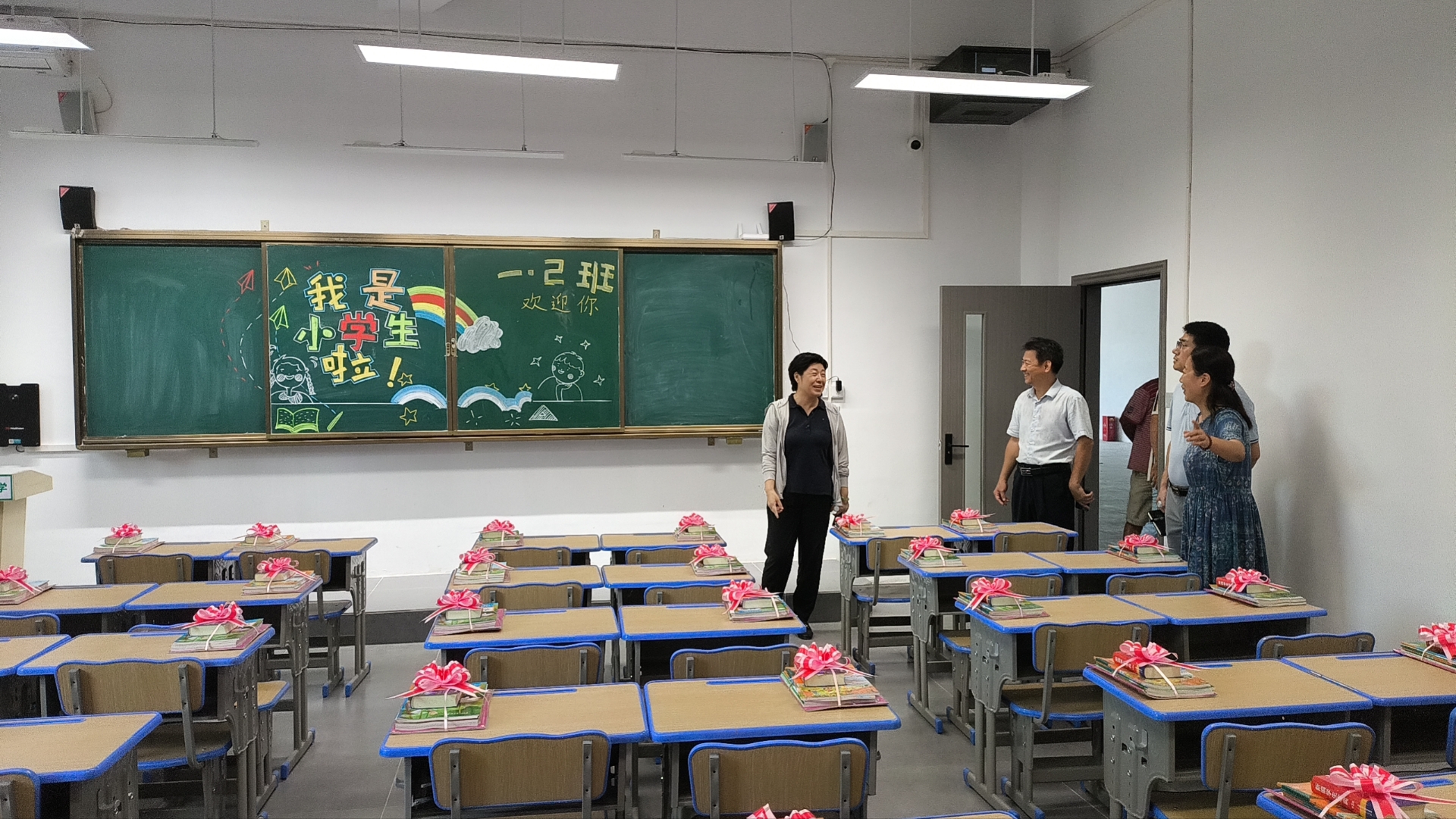 许玫一行到附属小学检查指导开学工作